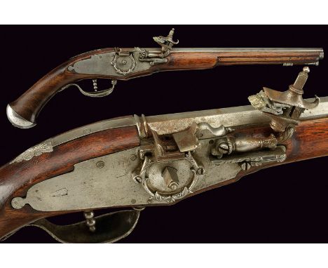A military wheel-lock pistol dating: 20th Century provenance: Europe Smooth, octagonal, 11 mm cal. barrel with frame at the b