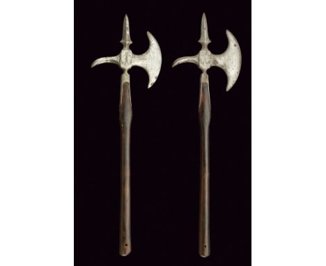 A pair of navy axes dating: early 19th Century provenance: France Iron head with round edge, beak-shaped hammer, ribbed and d