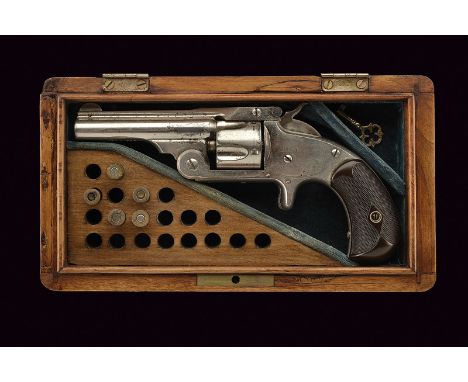 A cased S&W Model No. 1-1/2 Single Action Revolver dating: 1875-1890 provenance: USA Round, rifled barrel with rib featuring 