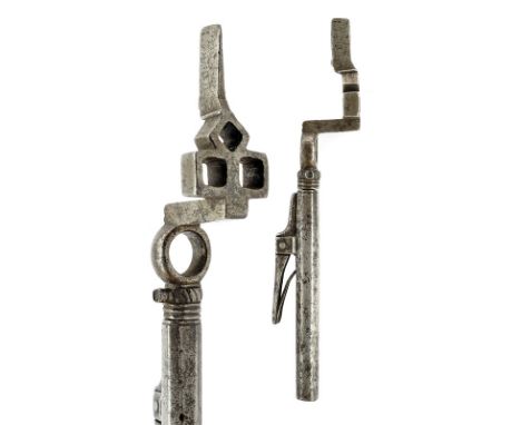 A rare wheel-lock key dating: 17th Century provenance: Italy Faceted grip with spring, at the inside a powder dispenser with 