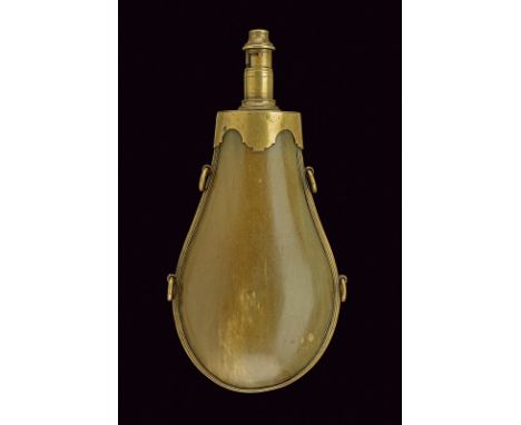 A powder-flask dating: 19th Century provenance: Europe Of pressed horn, flat at the back surface (small defects) and convex a