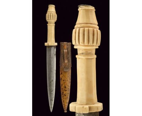 A rare Baoule dagger dating: early 20th Century provenance: Central Africa Strong, straight, double-edged blade, sightly ribb