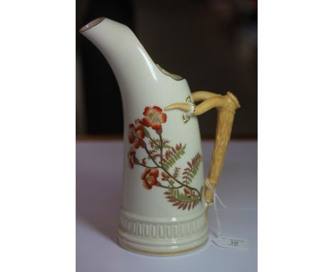 Royal Worcester "Tusk" ice water jug, with antler style handle and decorated with flowers, date code for 1886, minute gilded-