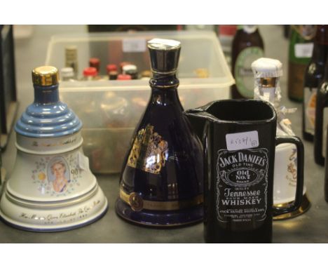 70cl Wade decanter of Bell's '50 years' commemorative blended Scotch Whisky, two empty decanters and a Jack Daniels jug