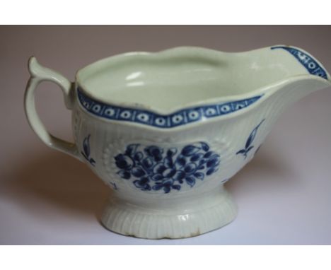 Worcester blue &amp; white painted floral decoration small sauceboat of silver shape, circa 1770, some old chips to underside