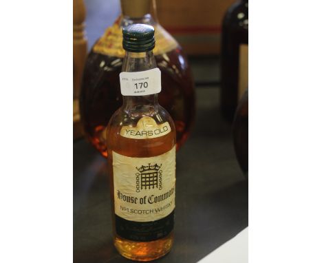 Two bottles of blended Scotch Whisky - a litre bottle of Dimple Haig and a 37.5cl bottle of Buchanan's No. 1 House of Commons