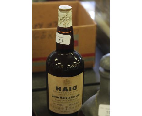 A 26 2/3 fl ozs bottle of Haig Gold Label blended Scotch Whisky