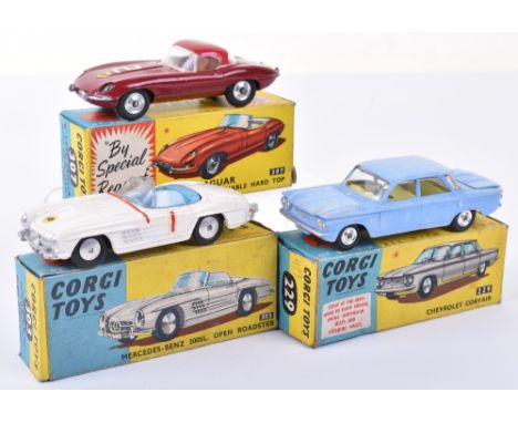 Three Boxed Corgi Toys Cars, 229 Chevrolet Corvair, pale blue, lemon interior, shaped wheel hubs, discolouration to paint, a 