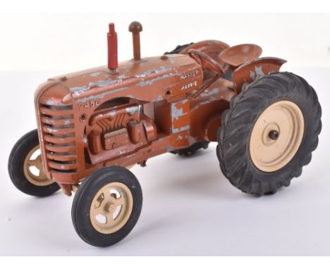 Lesney Large Scale Massey Harris 745D Tractor, 1:16 scale, red body, cream wheel hubs, in fair unboxed condition, replacement