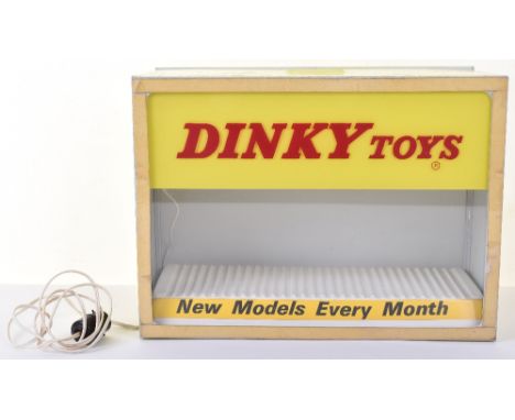 Scarce Dinky Toys Illuminated Shop Counter/Window display unit, aluminium metal yellow painted box, Perspex window to front, 