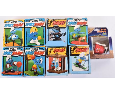 Boxed and loose Smurf figures, eight boxed Smurfs by Schleich, and six loose Smurfs, plus a boxed Playwell mini robot (15 ite