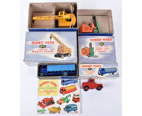 Three Boxed Dinky Toys, 401 Coventry Climax Fork lift truck, orange/green body,511 Guy 4-Ton lorry, violet blue cab/chassis, 