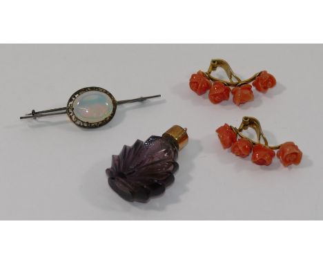 A pair of Continental silver gilt and coral clip on earrings, 3.2cm long, a small carved amethyst glass scent bottle with gol
