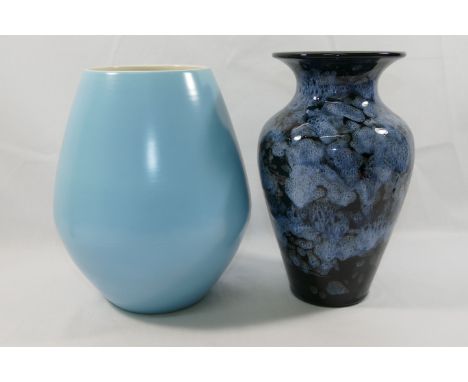 A Poole Pottery two tone duck egg blue and cream vase, 20.5cm high and an Ewenny Pottery vase with mottled glaze, 21cm high  