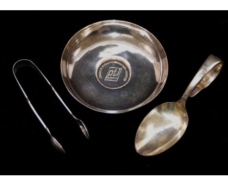 A small silver coloured metal dish, the centre cast, 'Premier Tobacco Industries Limited', the base marked PAK 94 SIL', 1.38o