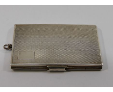 An George VI silver folding three section calling card case, Chester 1936, with engine turned decoration, 9.5cm high x 6cm wi