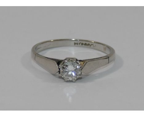 A diamond single stone ring, the round brilliant cut diamond approximately 0.35 carats, in claw setting, the shank stamped 'P