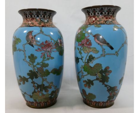 A pair of Japanese cloisonne enamel vases, decorated with birds amongst flowers on a turquoise ground, 19cm high   CONDITION 