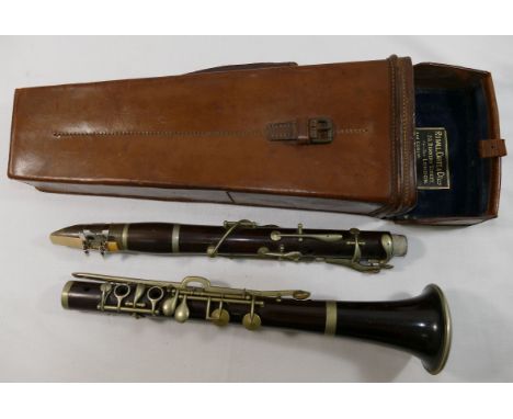 A Buffet Crampon Paris rosewood clarinet, serial no. 4881, housed in leather case   CONDITION REPORT:  If you require further