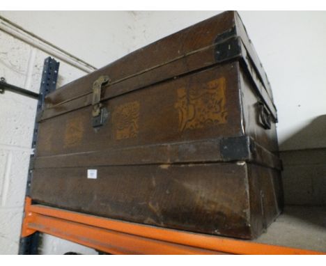 A LARGE METAL WOOD EFFECT TRUNK