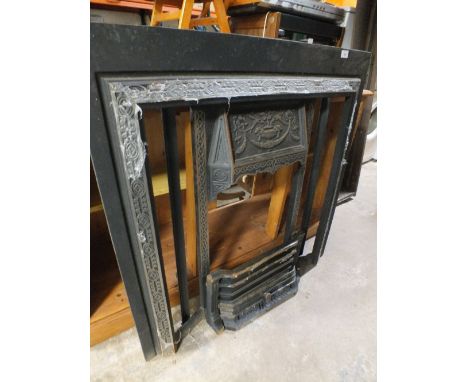 A CAST IRON FIRE SURROUND & GRATE