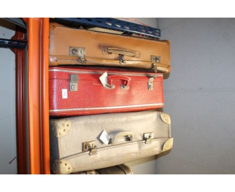 THREE LARGE VINTAGE SUITCASES