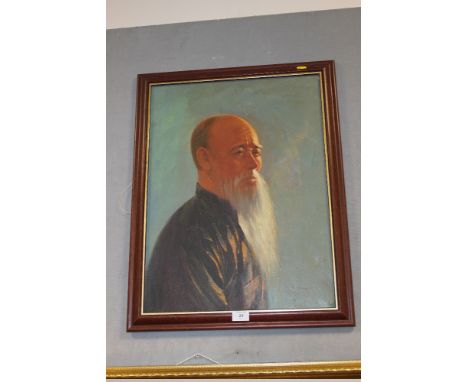 A FRAMED OIL ON CANVAS PORTRAIT