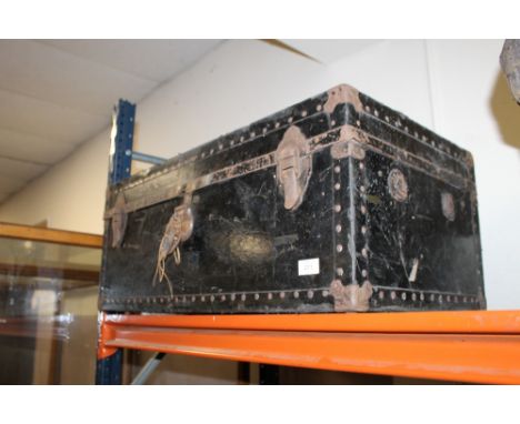 A LARGE VINTAGE BLACK TRUNK