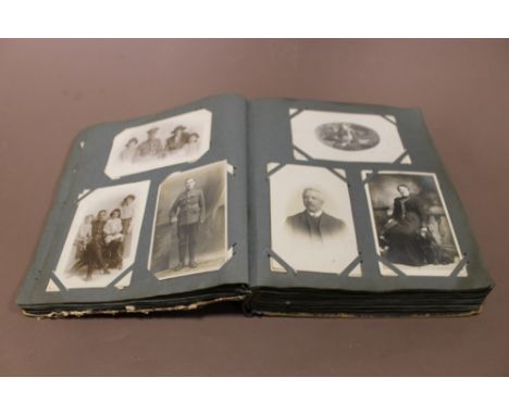 A VINTAGE POSTCARD ALBUM