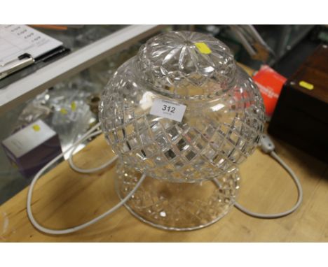 A CUT GLASS LAMP WITH CUT GLASS SHADE
