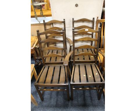 A SET OF FOUR DARK OAK ERCOL DINING CHAIRS