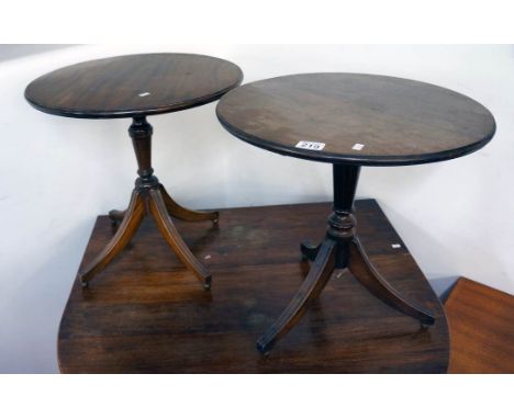 Pair of mahogany tripod lamp tables
