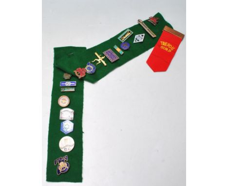 A good collection of vintage 20th century Girl Guide Scouting enamel pin badges to include: Trefoil Guild, Dorothy Mikelsons,