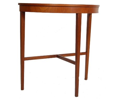 A vintage late 20th century teak wood demi lune / half moon / console / hall table raised on three tapered supports united by