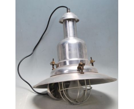 A vintage late 20th century industrial factory UFO cage ceiling hanging light / lamp having brushed aluminium pendant shade w