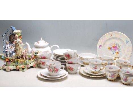 A collection of antique early 20th century ceramics to include two vintage late 20th century floral china tea sets with an or