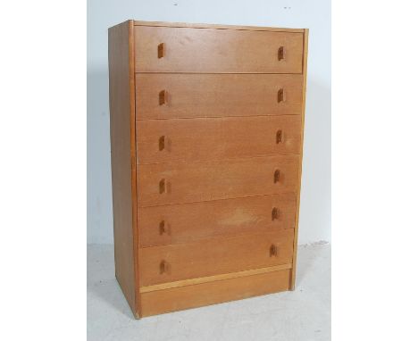 John and Sylvia Reid - Stag - A retro vintage 20th Century 1970's golden light oak upright pedestal chest of drawers. The che