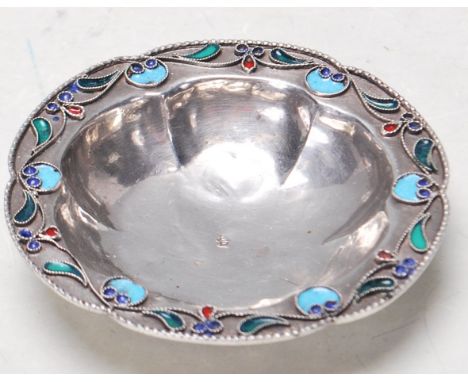 An antique early 20th century Imperial Russian 1000 grade silver having fine cloisonne enamel decoration raised on three bun 