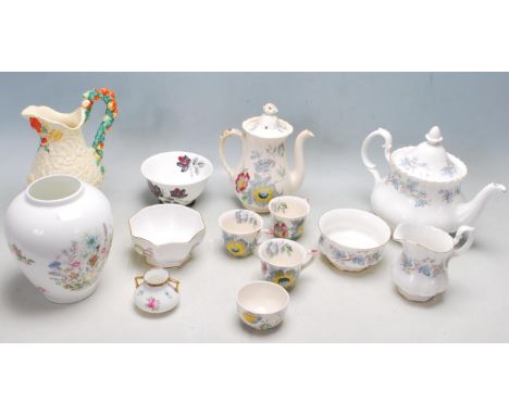 A collection of 20th century mixed china ceramic table ware to include Clarice Cliff water jug, Mason’s “Wild Rose” tea set c