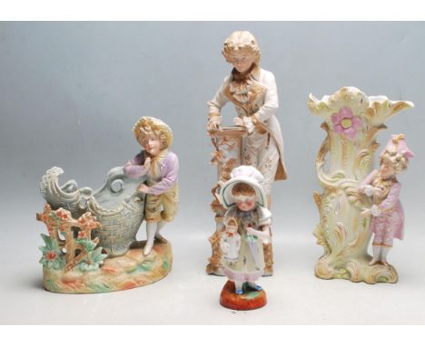 A group of three 20th Century bisque figurines to include a basket with a young boy modelled beside it (af)&nbsp; raised on a
