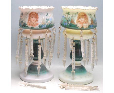 A pair of 19th Century Victorian mantelpiece lustres having crenelated rims each having transfer printed designs of girls to 