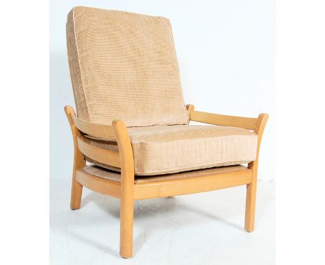 A late 20th century beech and elm&nbsp;Ercol Renaissance Piccola high back easy chairs with ladder type backrest with detacha