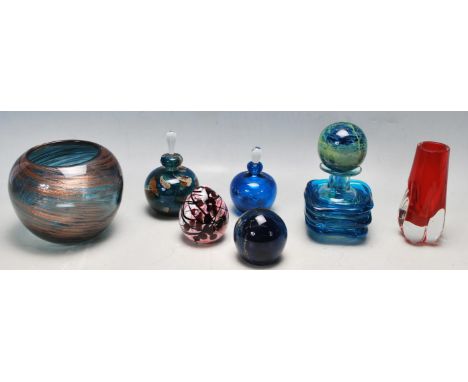 A collection of seven retro vintage coloured studio art glass&nbsp;to include a Whitefriars ruby vase 9727, a Mdina blue and 