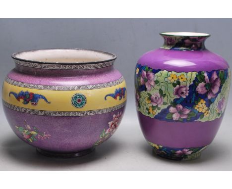 An early 20th century Bristol ware ceramic vase / plant pot of a bulbous form with Greek keys decoration to the rim, yellow d