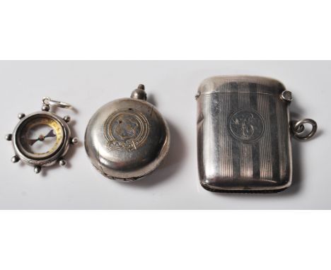 A collection of two antique hallmarked sterling silver items comprising of vesta case bearing hallmarks for Birmingham 1912, 