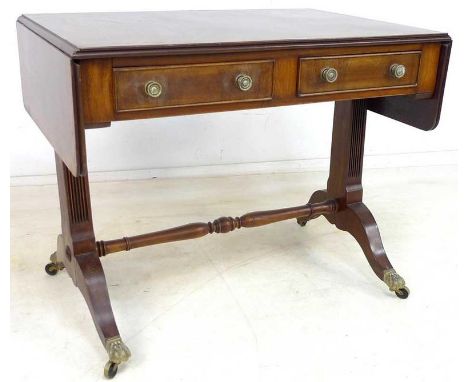 An antique style Georgian revival mahogany drop leaf sofa table of square form having a single drawer raised on splayed legs 