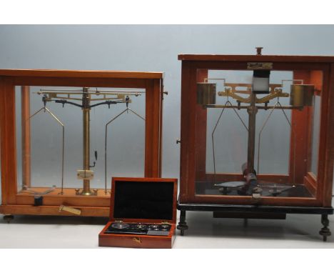 Two vintage 20th Century cased &nbsp;laboratory scales to include a Philip Harris Ltd scientific / apothecary / laboratory sc