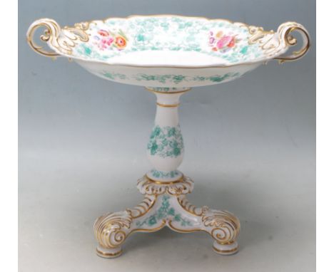 A 19th century Victorian W.T. Copeland ceramic tazza &nbsp;/ centrepiece bow having twin handles to the top plate, scrolled g