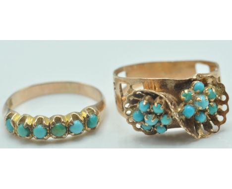 A vintage 9ct gold and turquoise ring having pierced decoration shoulders with a large crossover style head set with two turq