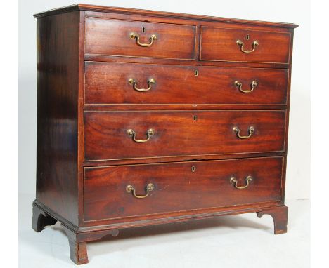 An antique 19th century Georgian mahogany chest of drawers having a flared top over a  bank of two over three drawers with br